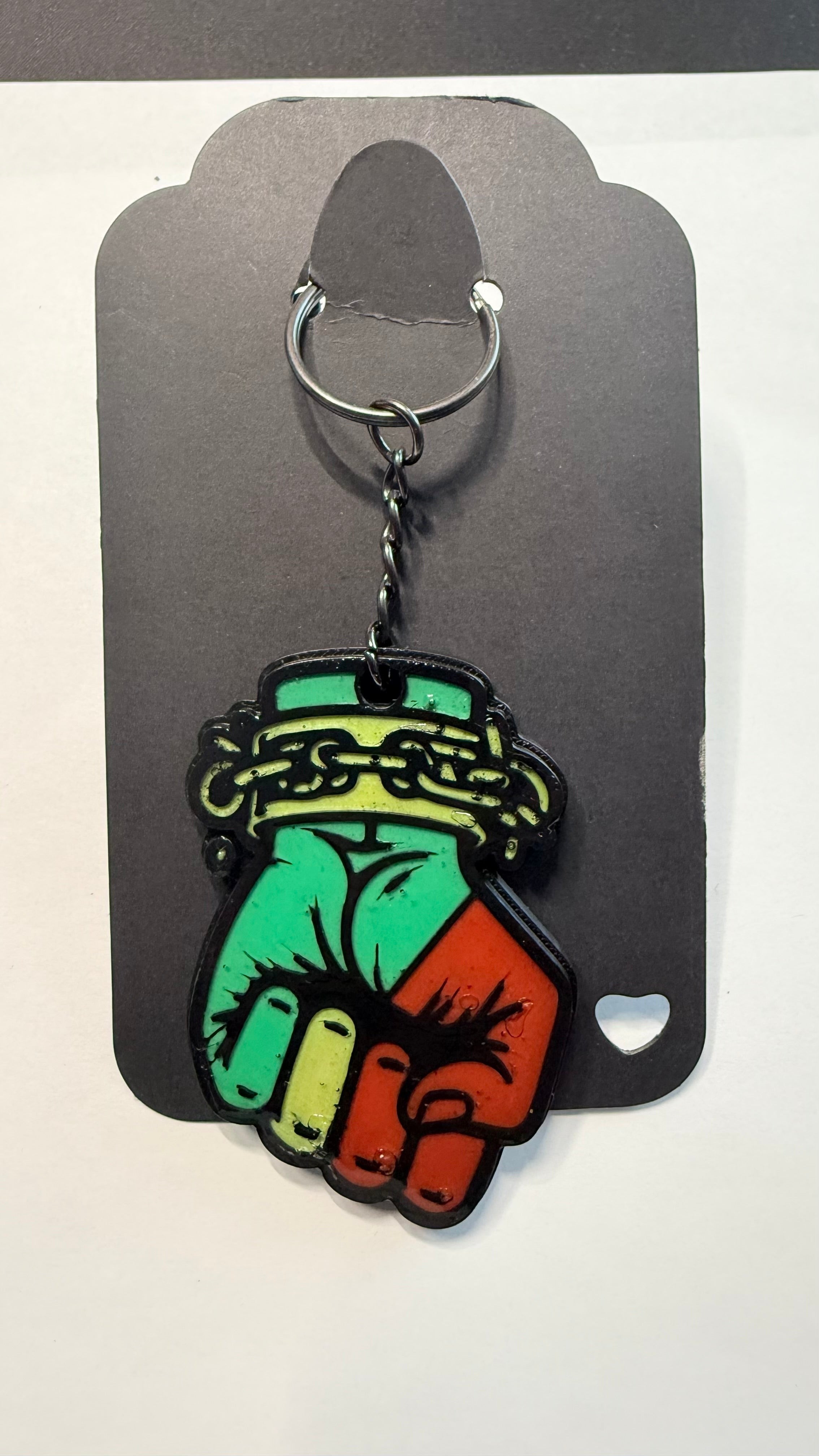 FLY-OG 3D Juneteenth Fist of Power keychain with broken chains, red, black, and green Pan-African colors.