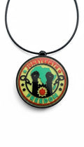 FLY-OG 3D Juneteenth Freedom Medallion pendant necklace with raised fists, broken chains, and Africa silhouette on a black cord.